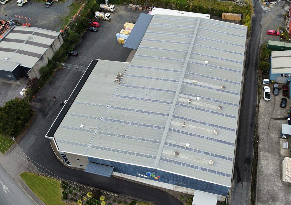 A large commercial building with new long run roofing.