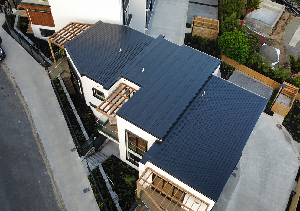 Aerial photograph of a roof install on new apartment buildings.