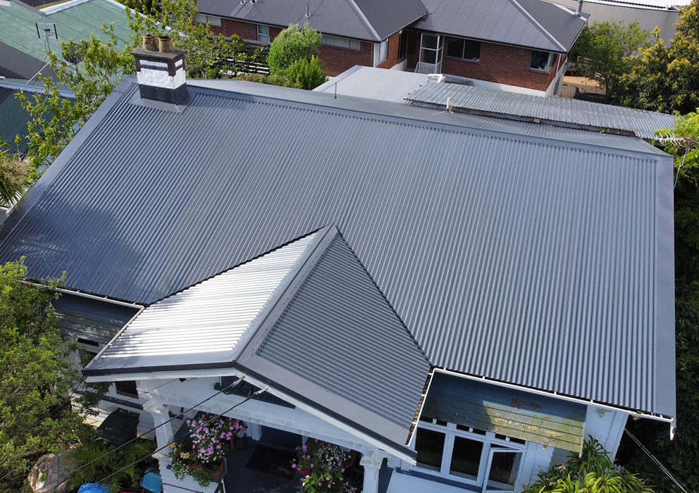 New light grey steel roof on a residential property.